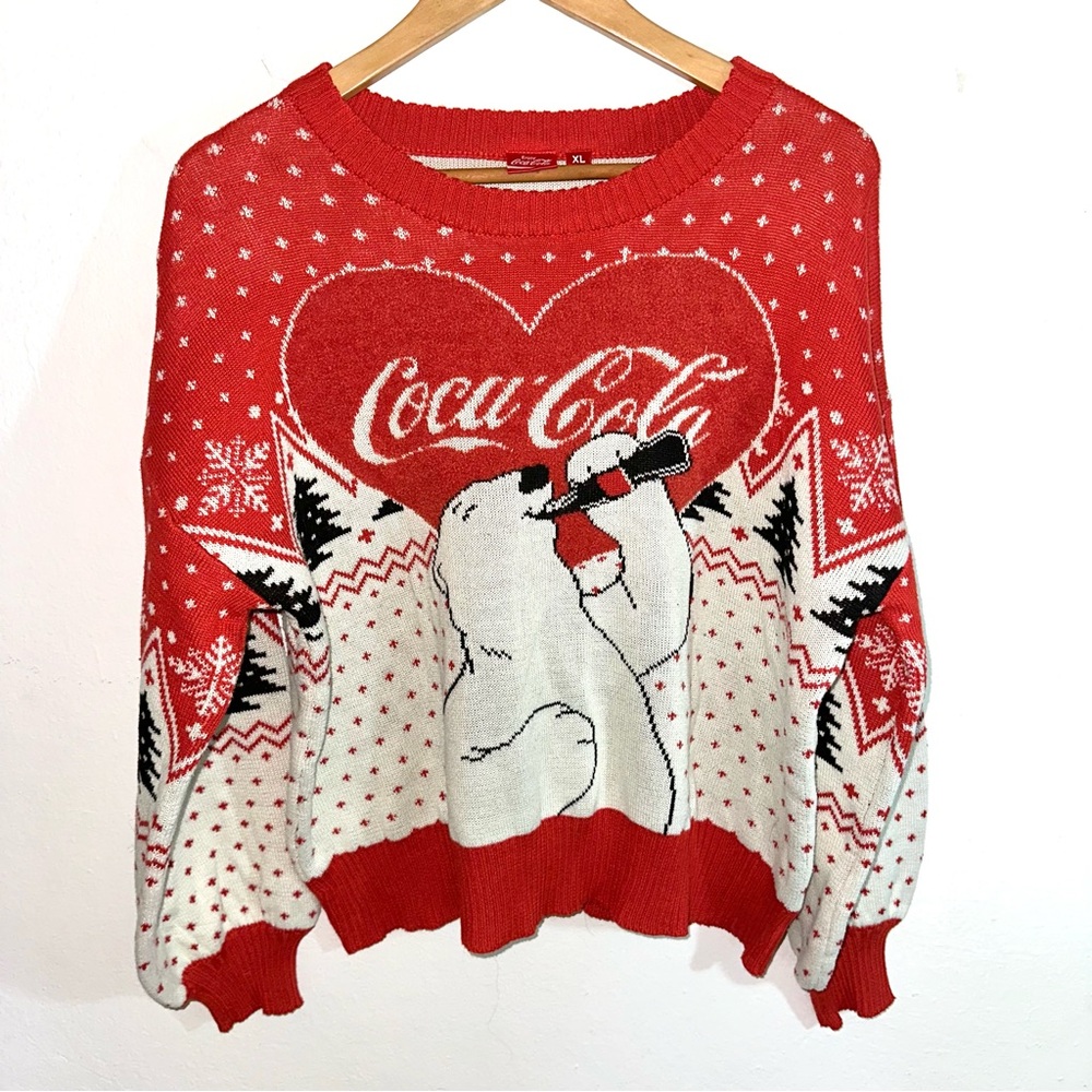 Coca-Cola sweater
Size XL
Used
Price: $13